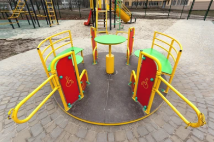 A picture containing playground, ground, outdoor play equipment, public spaceDescription automatically generated